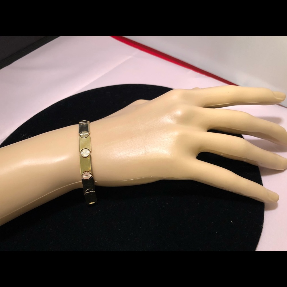 14K Gold Bracelet resemblances the Love Bracelet